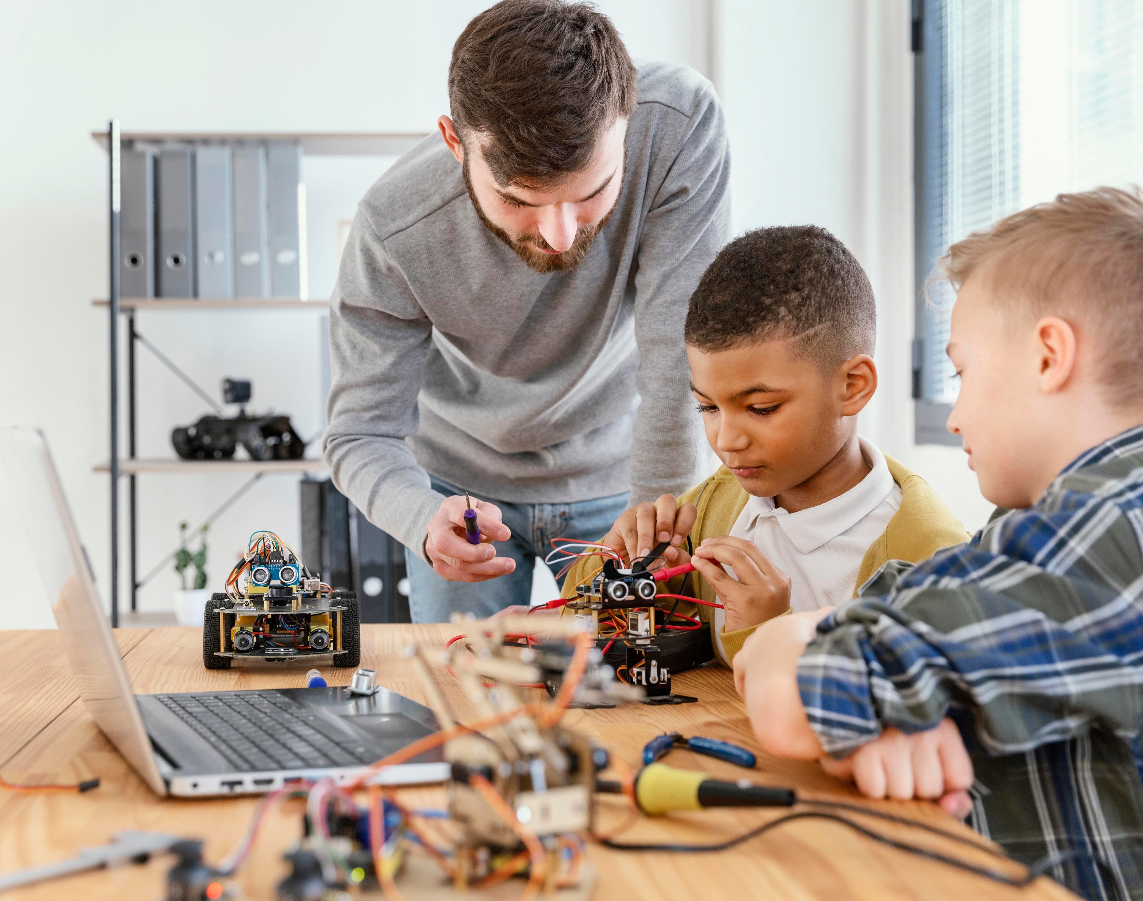 Students learning robotics and coding